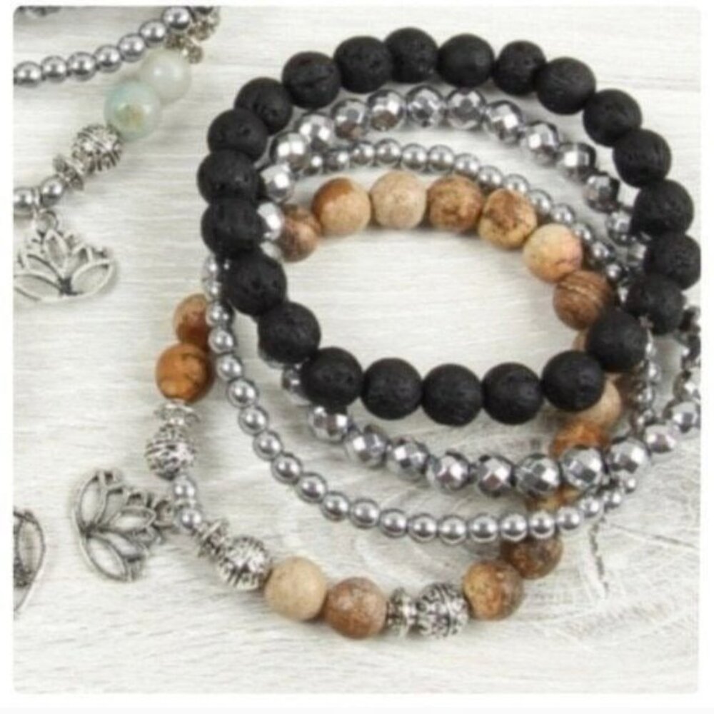 BROWN LOTUS CHARM STACK BRACELET. NEW.